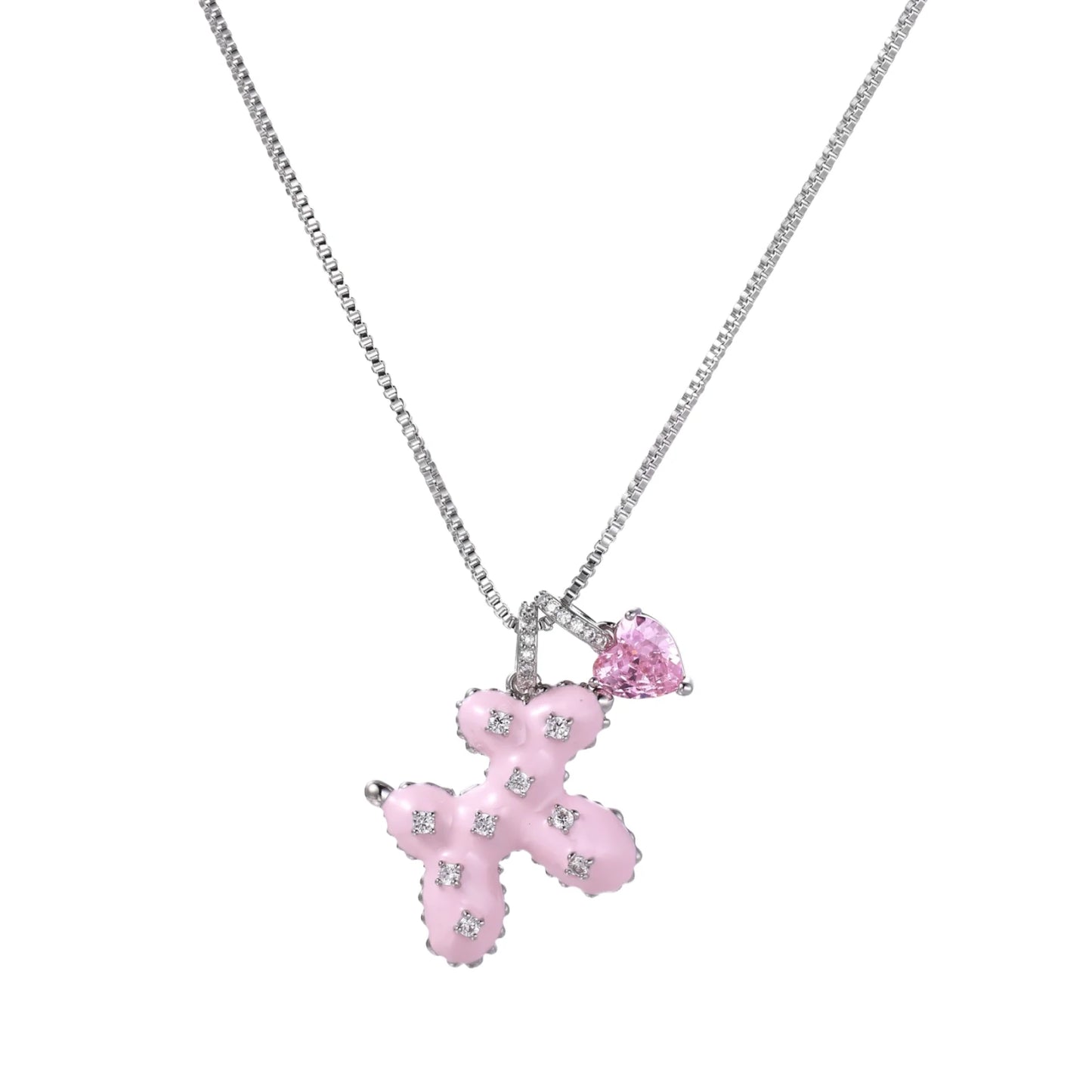Pink enamel teddy bear pendant with crystal accents and heart charm on white gold chain