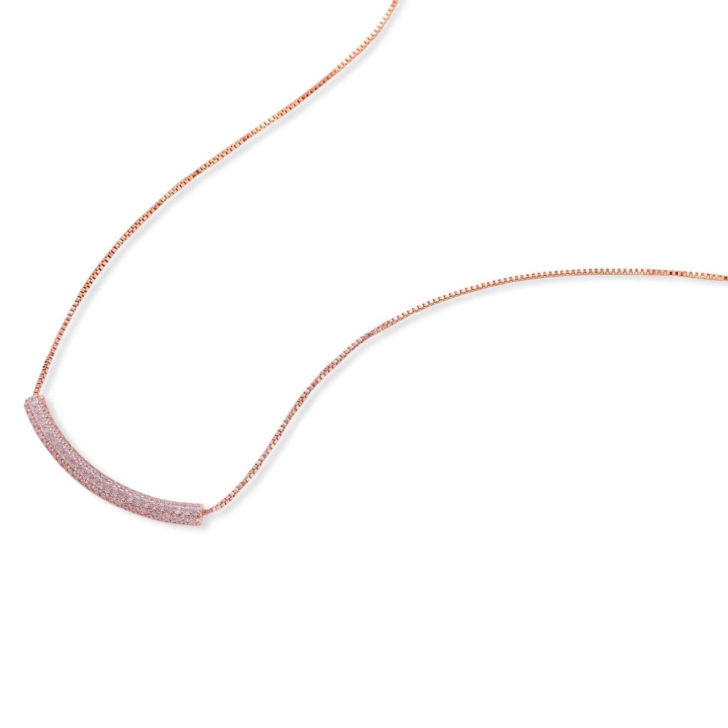 Rose gold jewelry set with pavé cubic zirconia stones including curved necklace, hoop earrings, and adjustable ring on cream background.