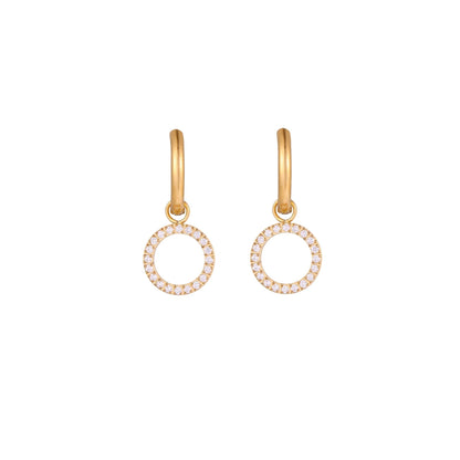 Gold-plated huggie hoop earrings with CZ-studded open circle charms on beige background