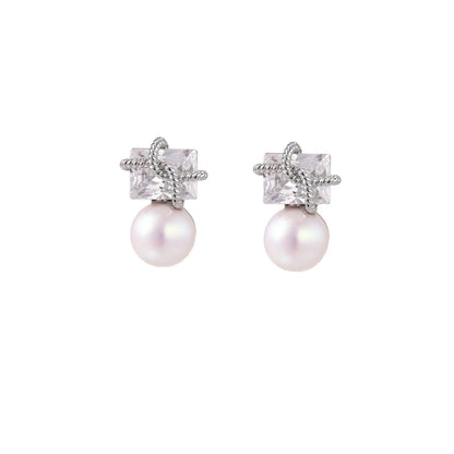 White gold stud earrings with square crystal stones in twisted frames and pink freshwater pearl drops below