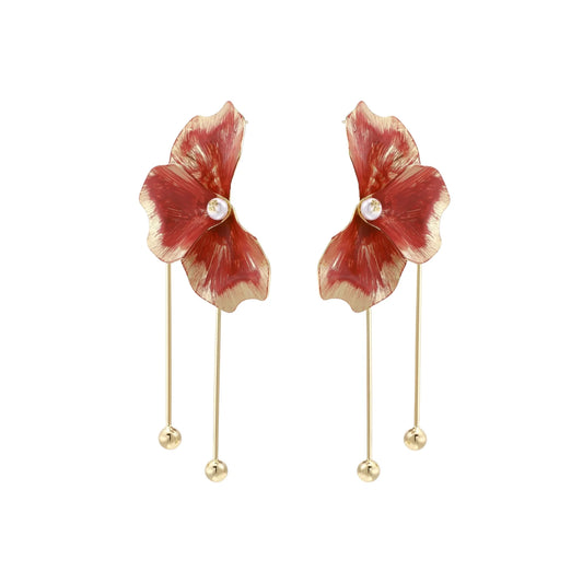 Red enamel flower earrings with gold-plated stems, central pearl, and gradient coral-to-gold petals on white background