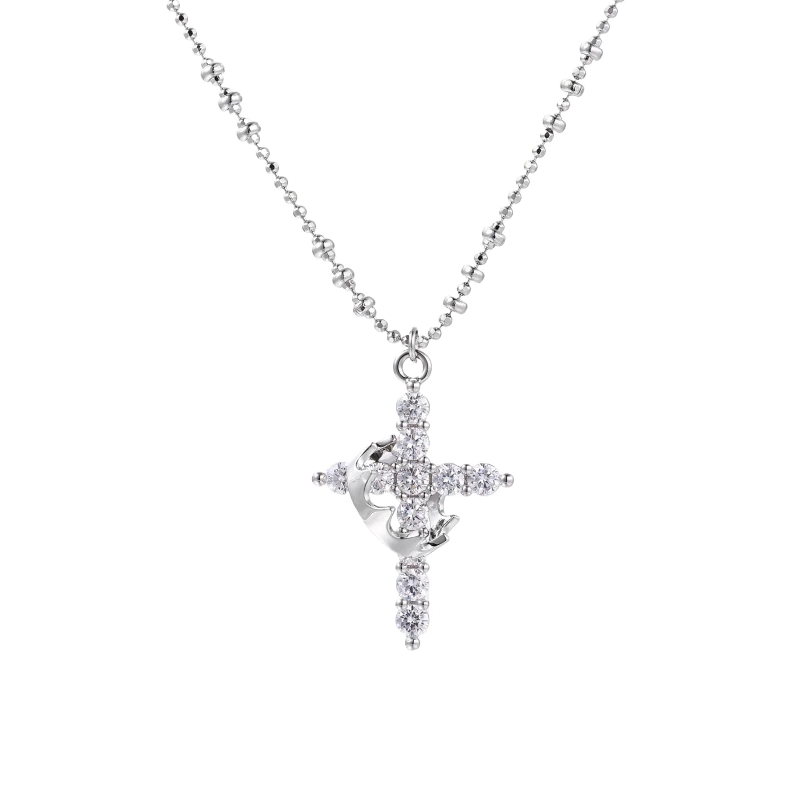 White gold-plated cross pendant adorned with sparkling zirconia stones and crescent moon accent on ball chain