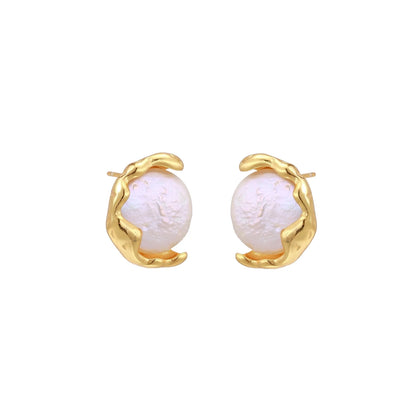 Gold vermeil studs with lustrous pink freshwater pearls in organic crescent settings