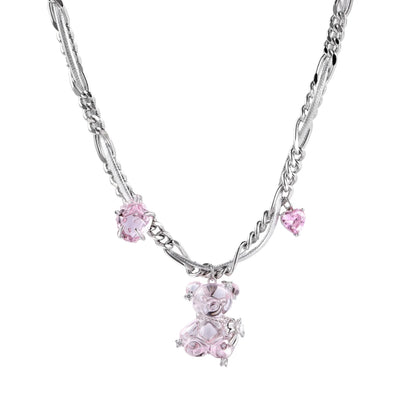 Silver twisted chain necklace with fairy tale carriage pendant adorned with pink cubic zirconia gemstones