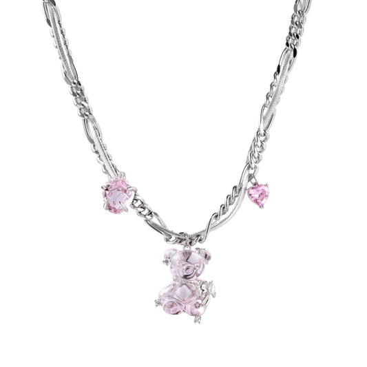 Silver twisted chain necklace with fairy tale carriage pendant adorned with pink cubic zirconia gemstones