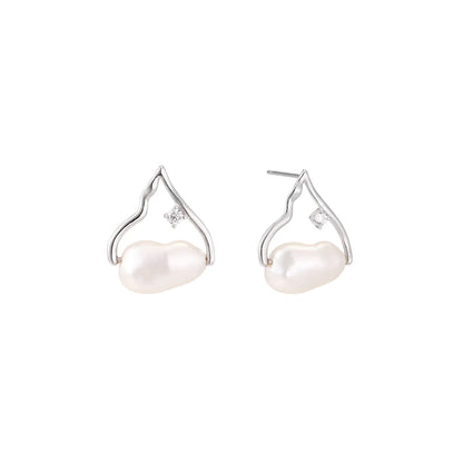 Silver mountain outline studs with baroque pearl and diamond accent on white background