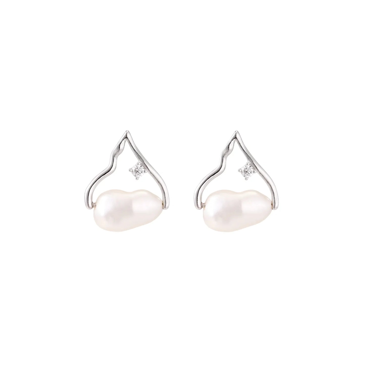Silver mountain outline studs with baroque pearl and diamond accent on white background
