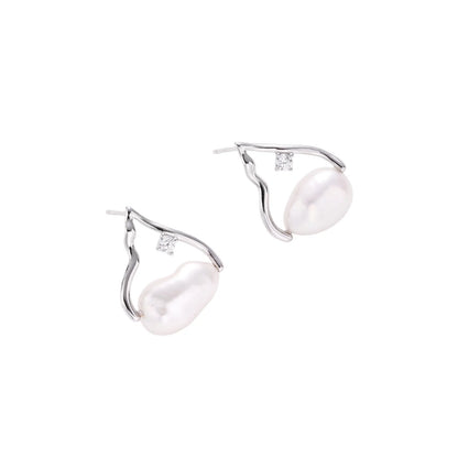 Silver mountain outline studs with baroque pearl and diamond accent on white background
