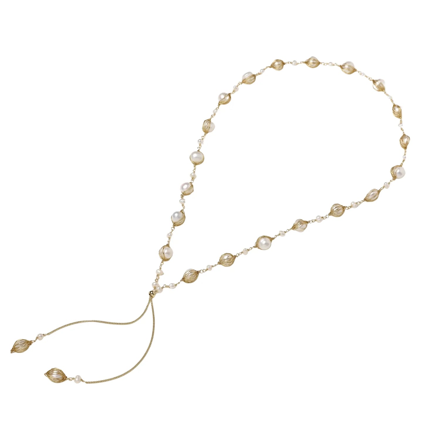 Adjustable gold lariat necklace with freshwater pearls nested in delicate cage settings and Y-shaped tassel drop