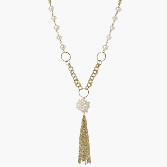 Long gold-plated necklace with freshwater pearls, chunky chain links, and flowing tassel pendant