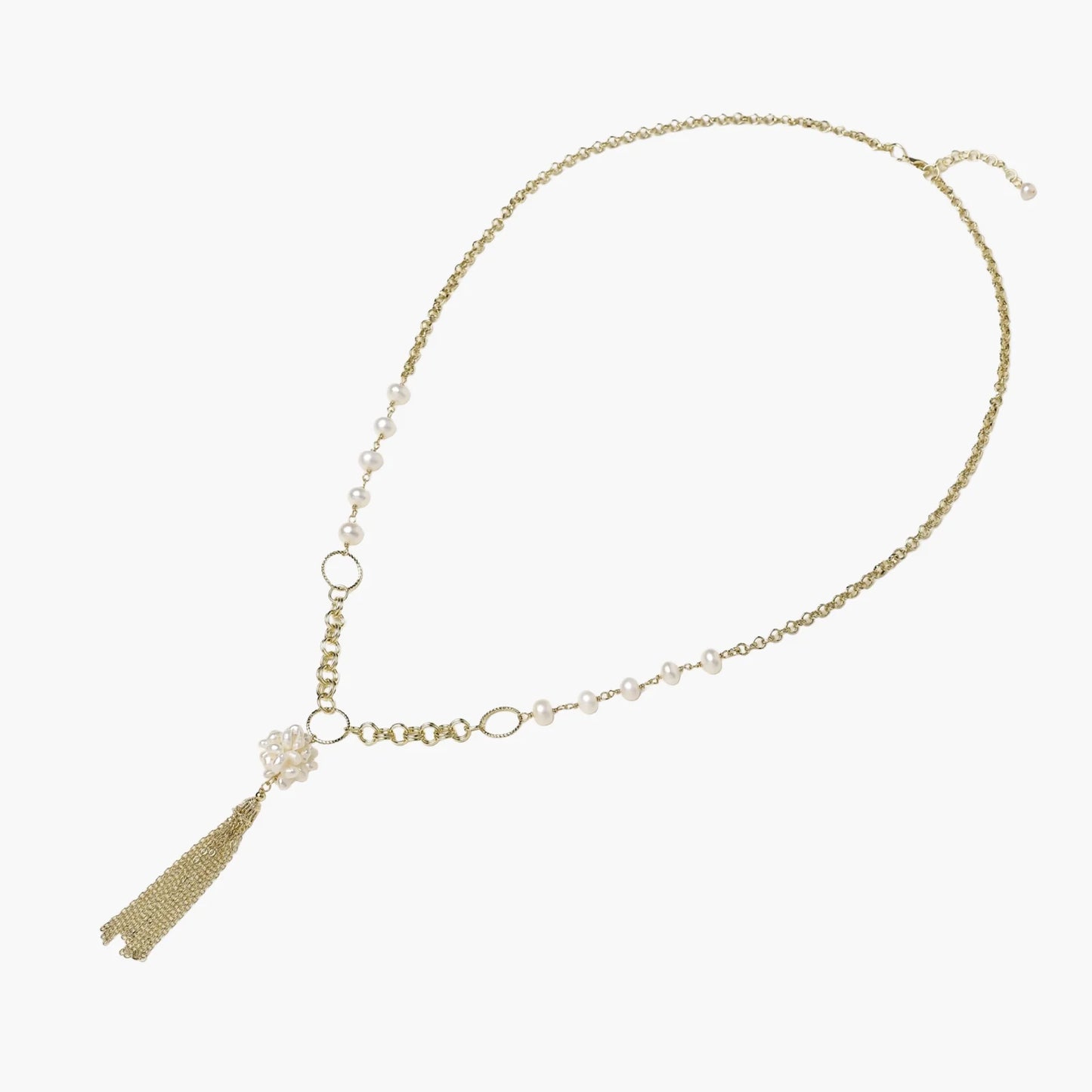 Long gold-plated necklace with freshwater pearls, chunky chain links, and flowing tassel pendant