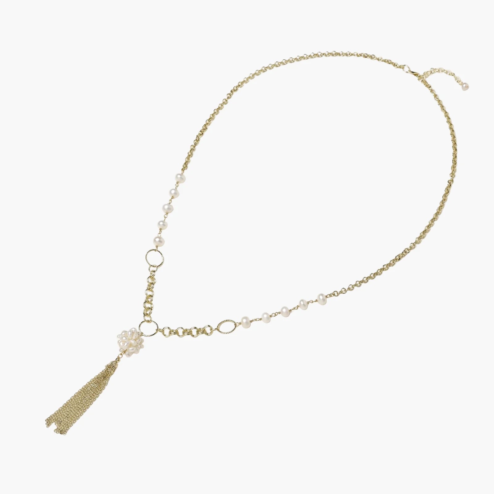 Long gold-plated necklace with freshwater pearls, chunky chain links, and flowing tassel pendant