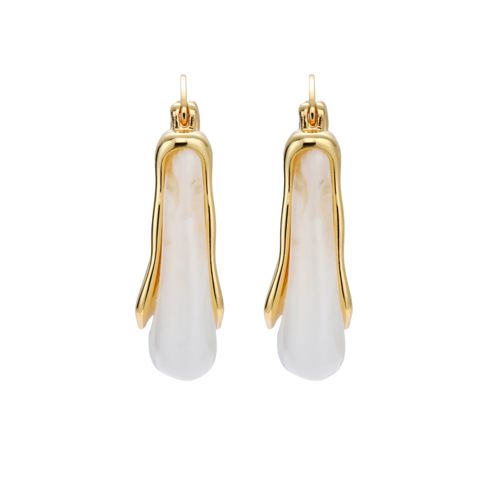 Sculptural gold-plated hoop earrings with flowing curved design and lever-back closure on cream background.