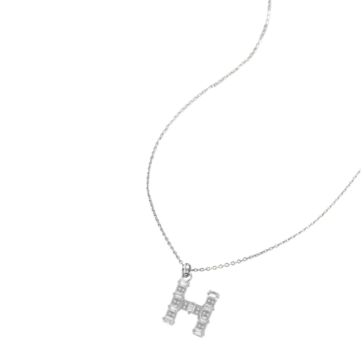Letter H jewelry set featuring geometric crystal design in gold and white gold plated finish with adjustable chain necklace