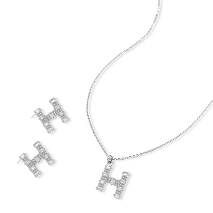 Letter H jewelry set featuring geometric crystal design in gold and white gold plated finish with adjustable chain necklace