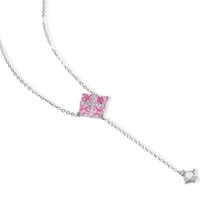White gold plated jewelry set with pink cubic zirconia stones in geometric cross design, featuring Y-necklace and square stud earrings