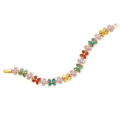 Gold-plated jewelry set with pink, turquoise and red flower-shaped cubic zirconia stones, featuring necklace, earrings and bracelet.